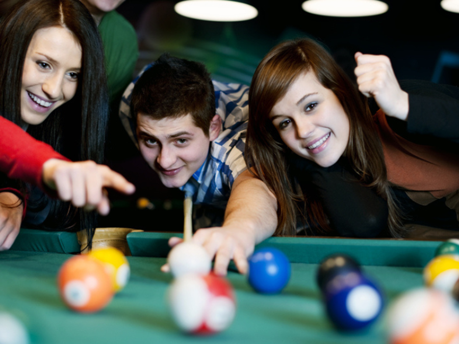 people playing billiards