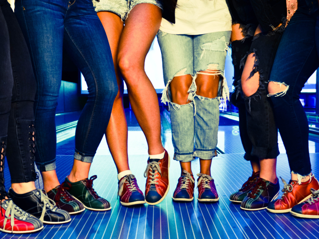 peoples feet bowling lane